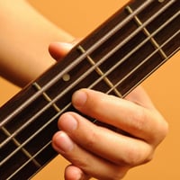 Learn how to play Bass Guitar thumb