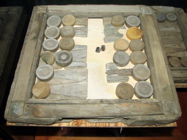 An ancient backgammon set An ancient backgammon set
