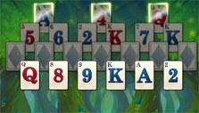 Glowing crowned cards in Solitaire in Wonderland